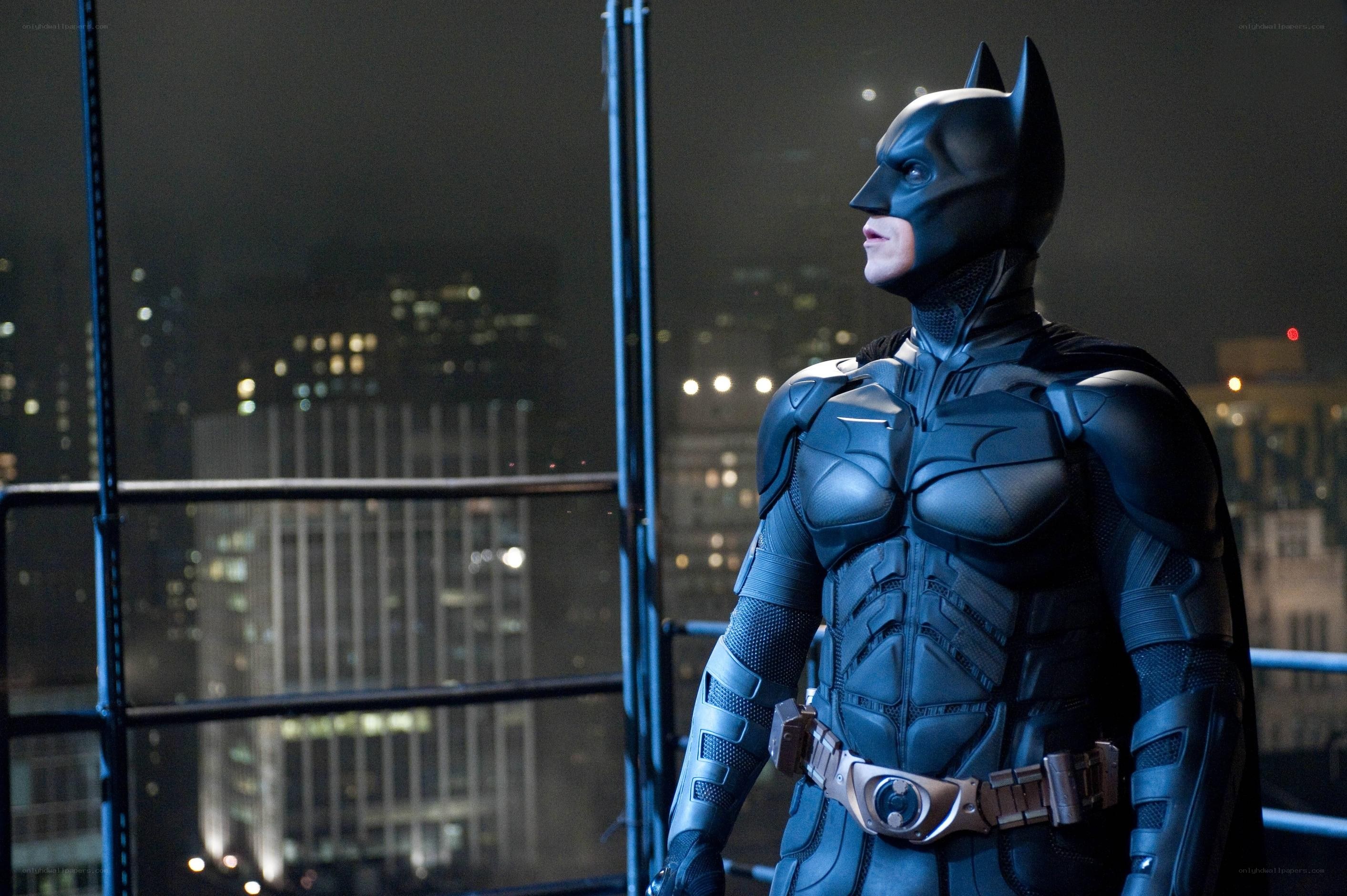 Batman on a rooftop at night