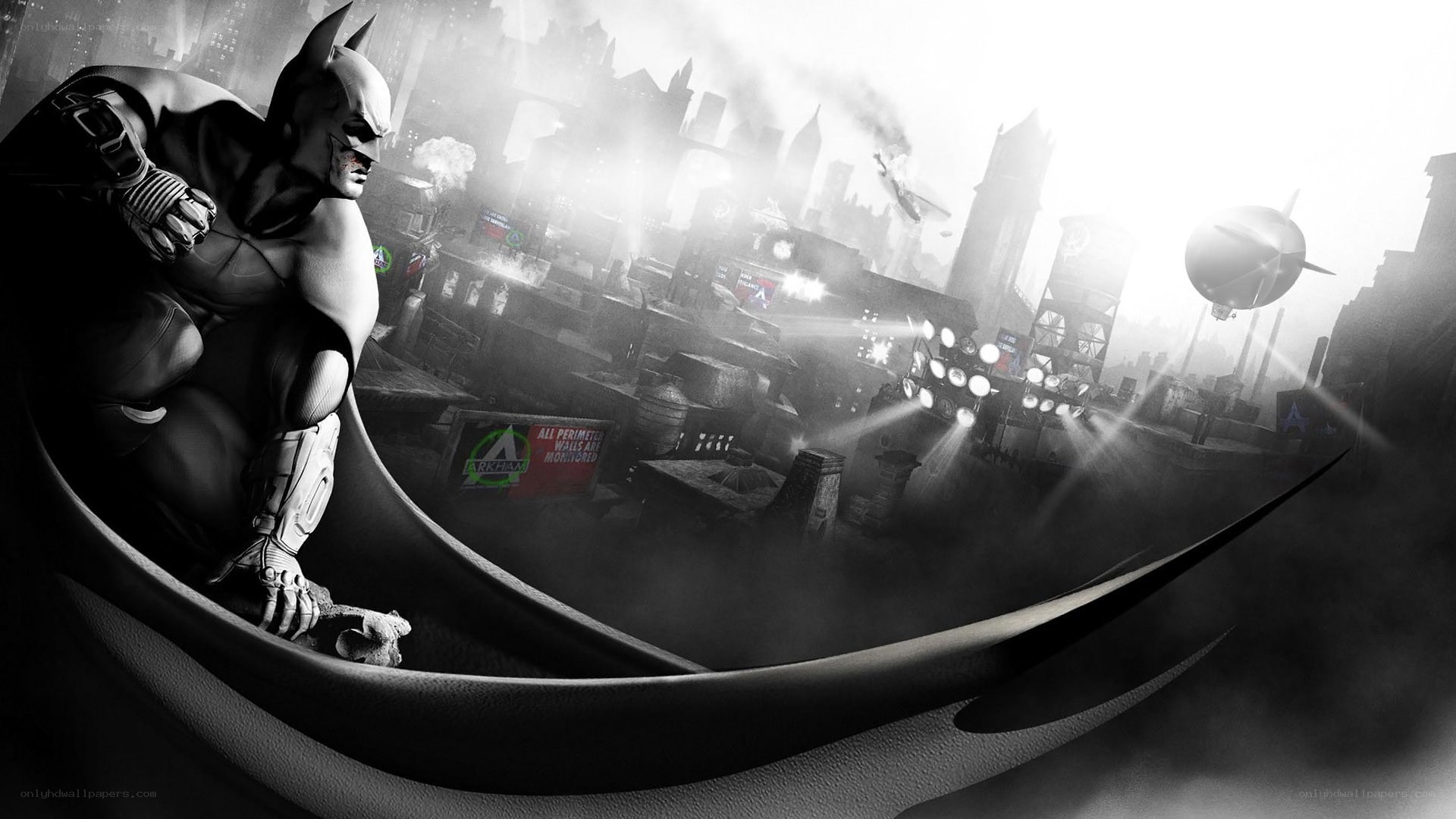 Batman on a rooftop at night