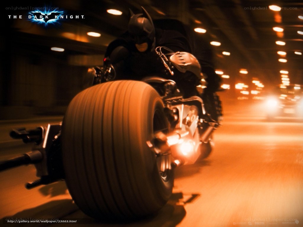 Batman on Batcycle in tunnel