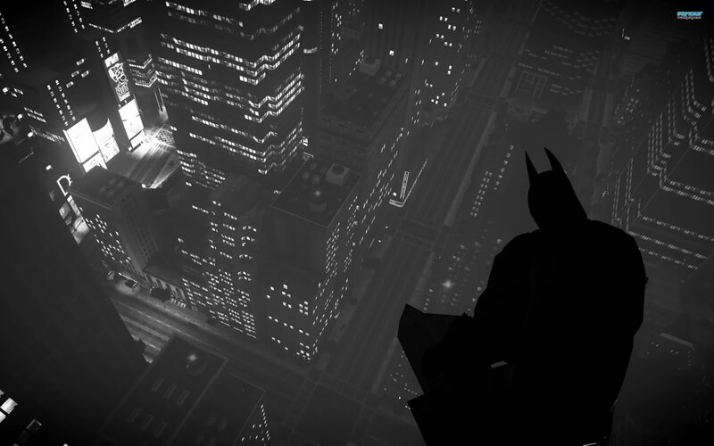 Batman overlooks the city