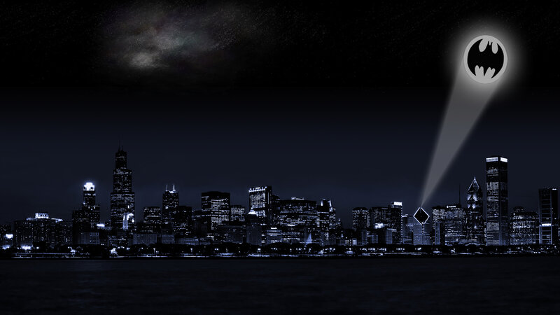 Batman signal over city skyline