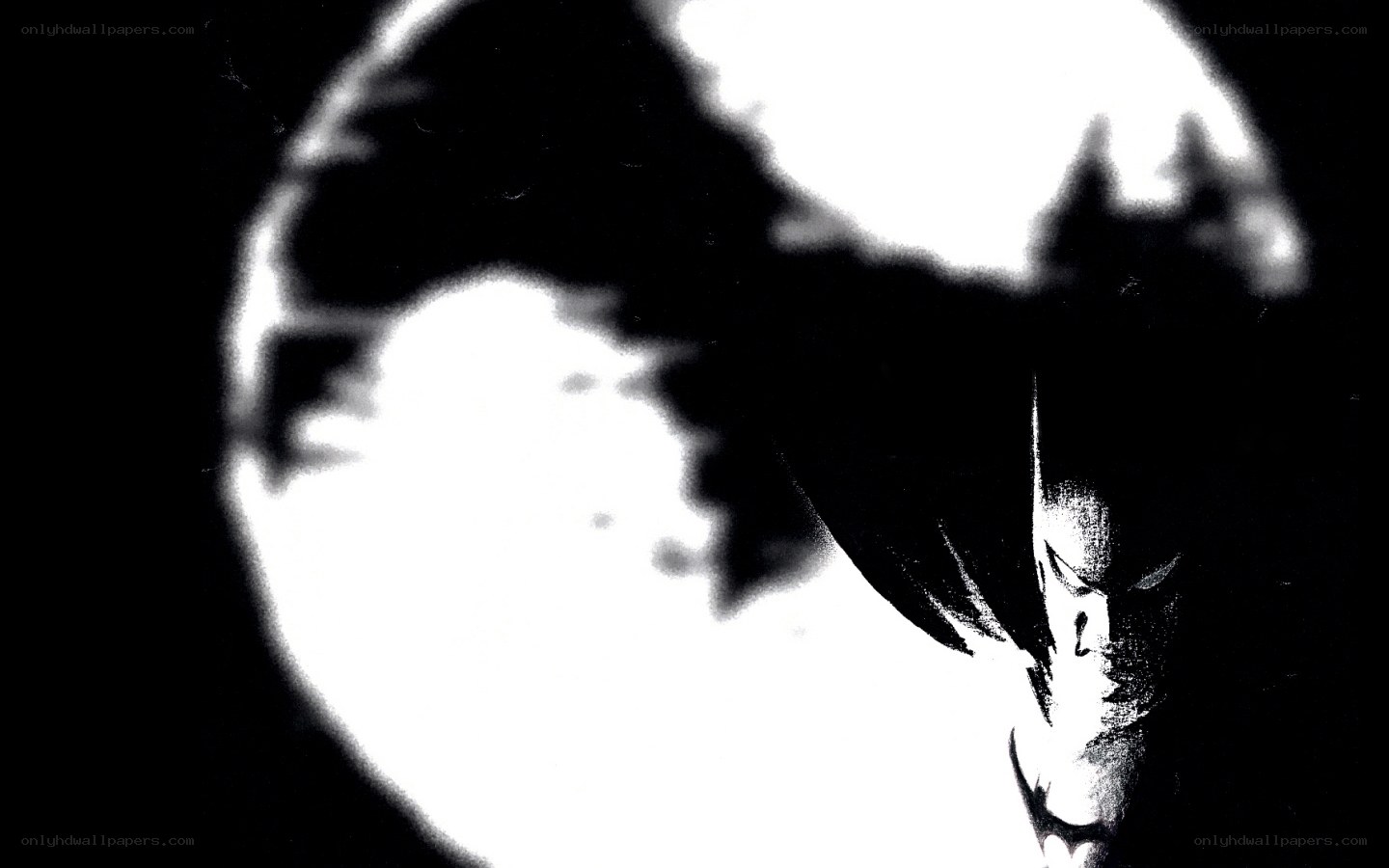 Batman silhouette against moon