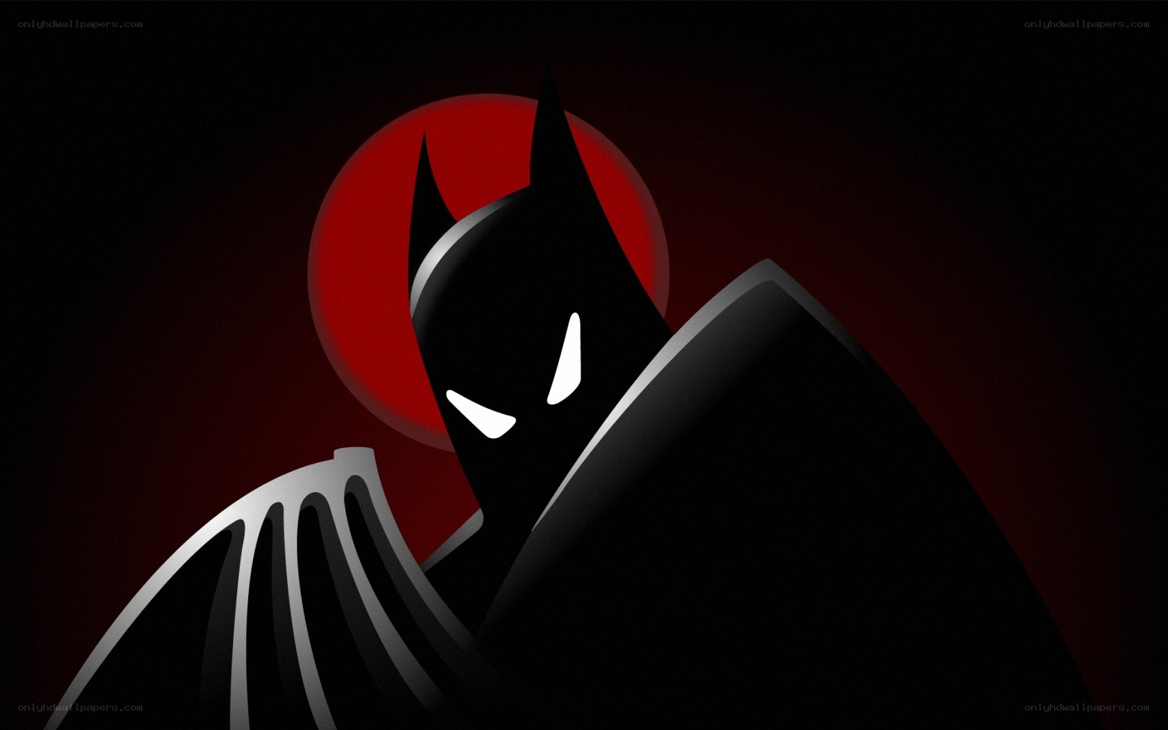 Batman silhouette against red moon