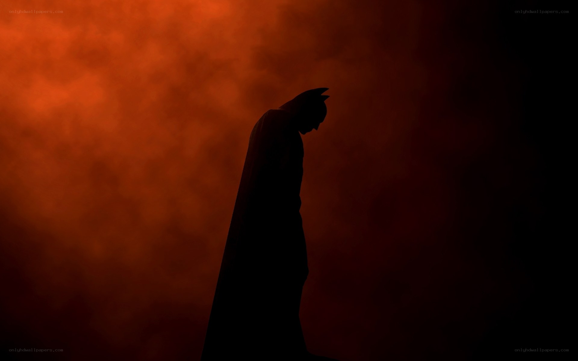 Batman silhouette in red smoke