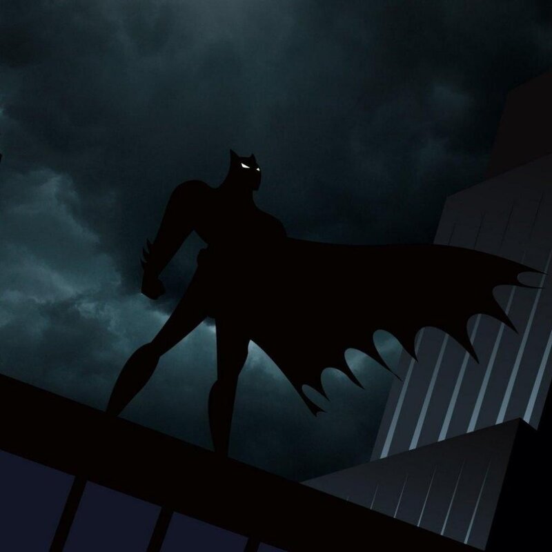 Batman silhouette on rooftop