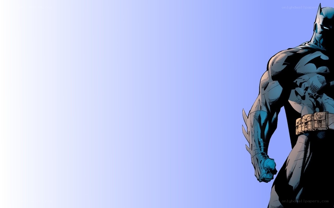 Batman standing on blue background
