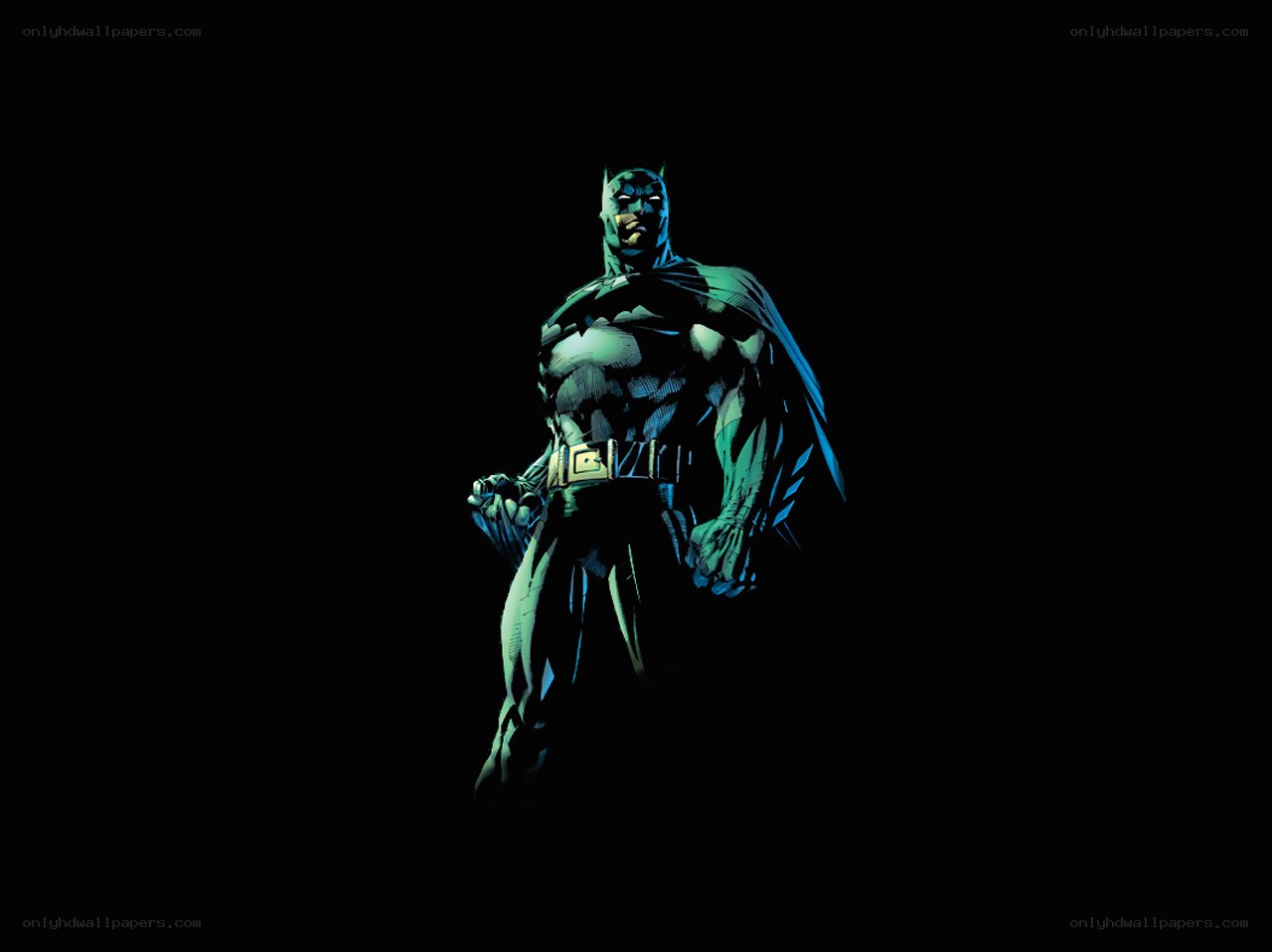 Batman stands in the dark