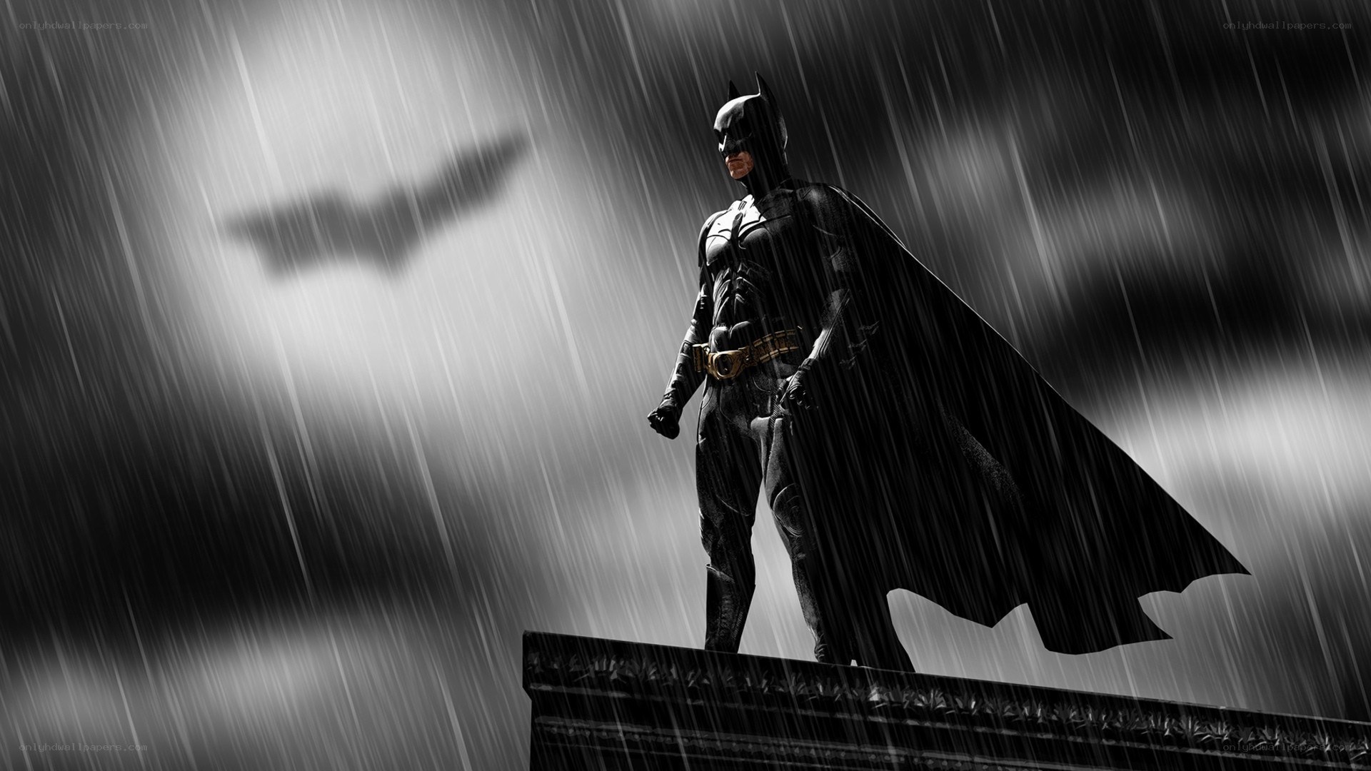 Batman stands in the rain