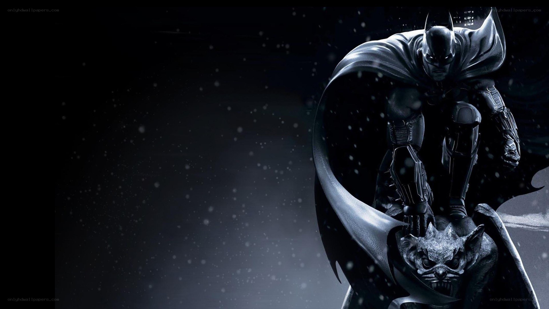 Batman stands on a gargoyle