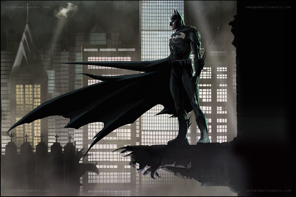 Batman stands on a rooftop