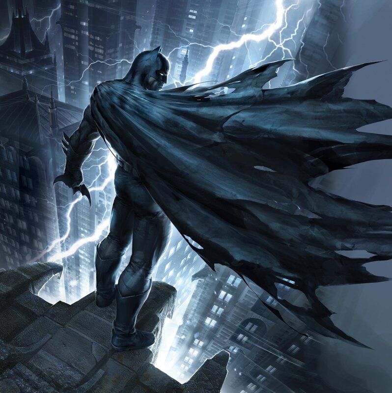 Batman stands on a rooftop