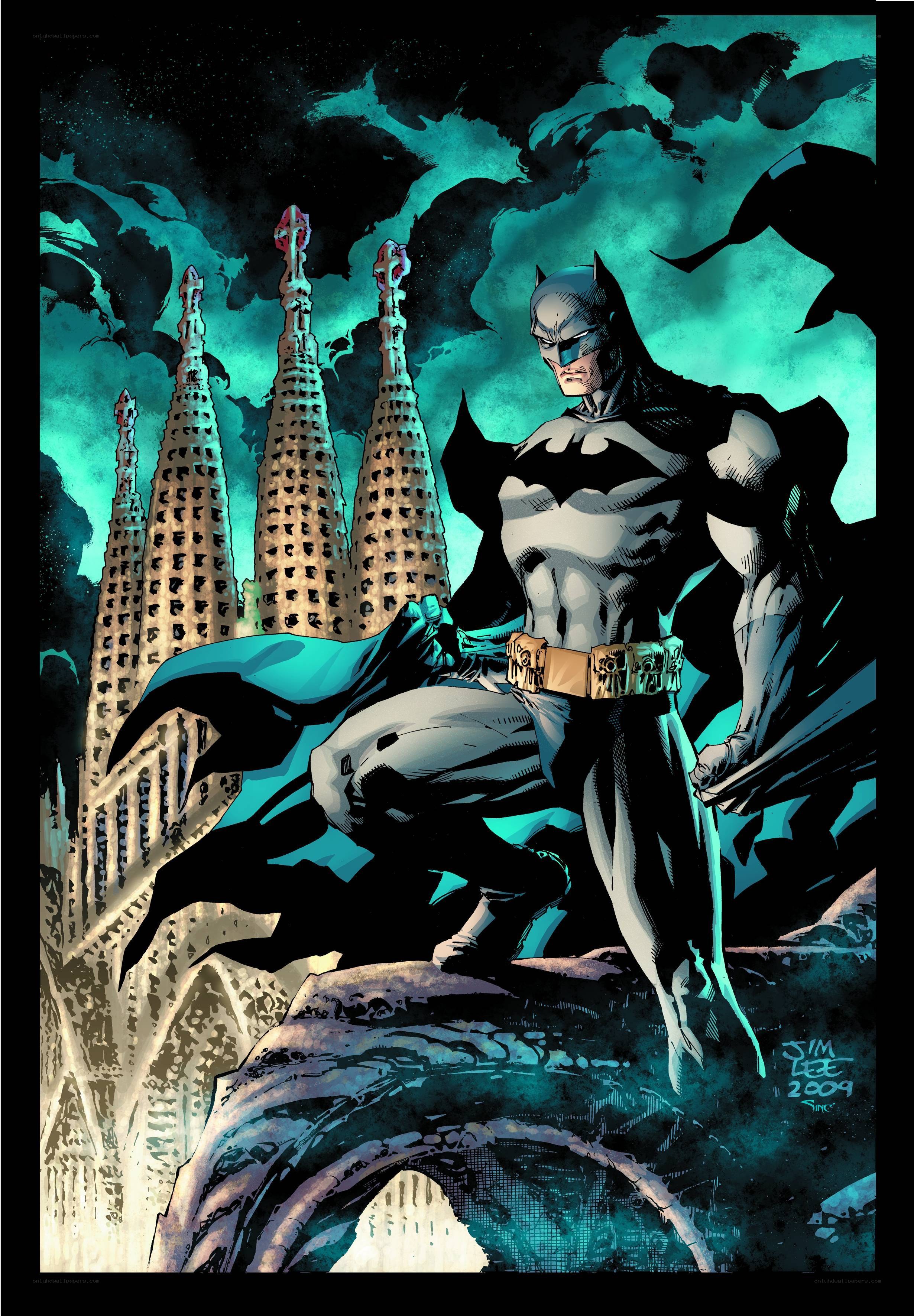 Batman stands on a rooftop