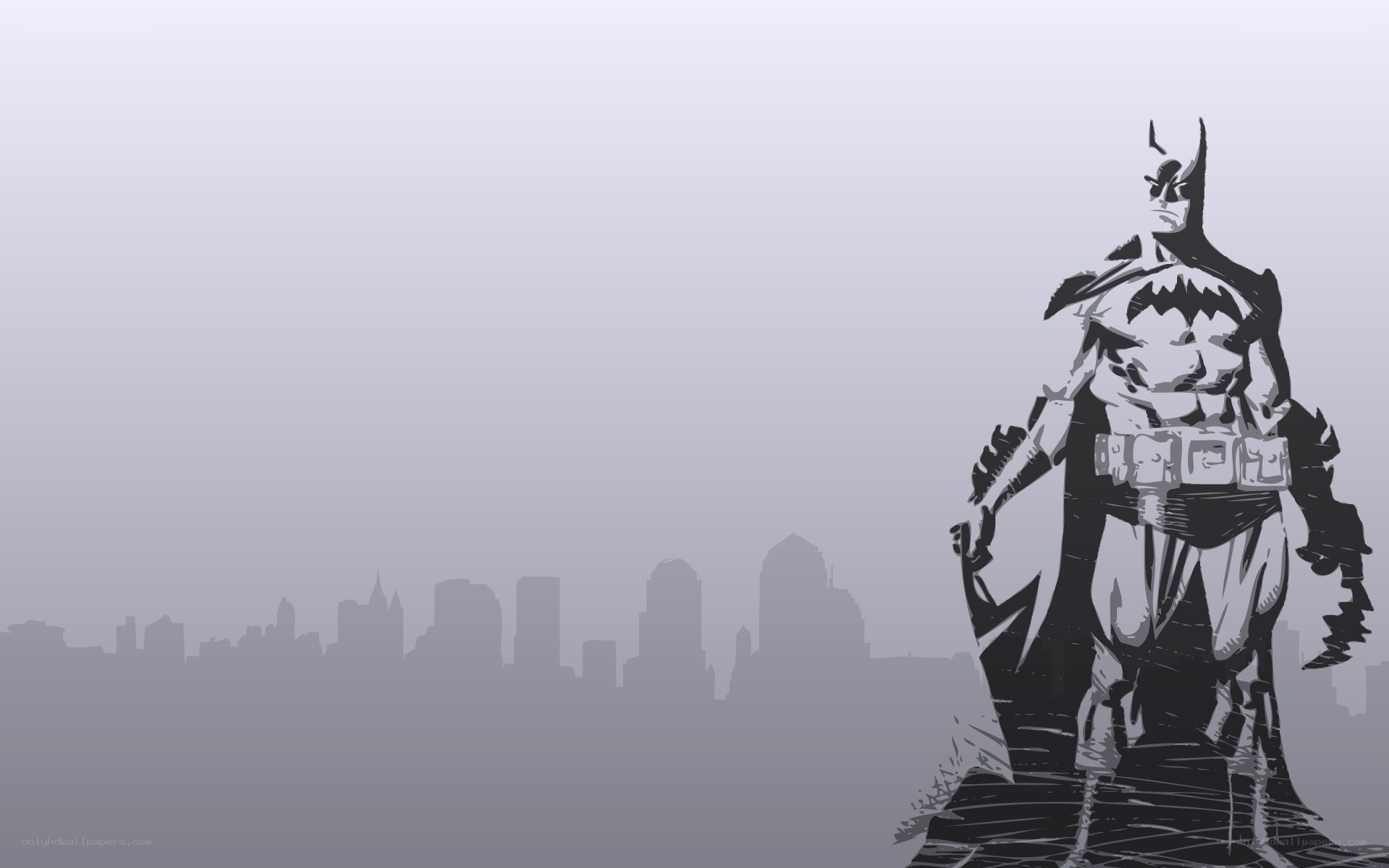 Batman stands over city