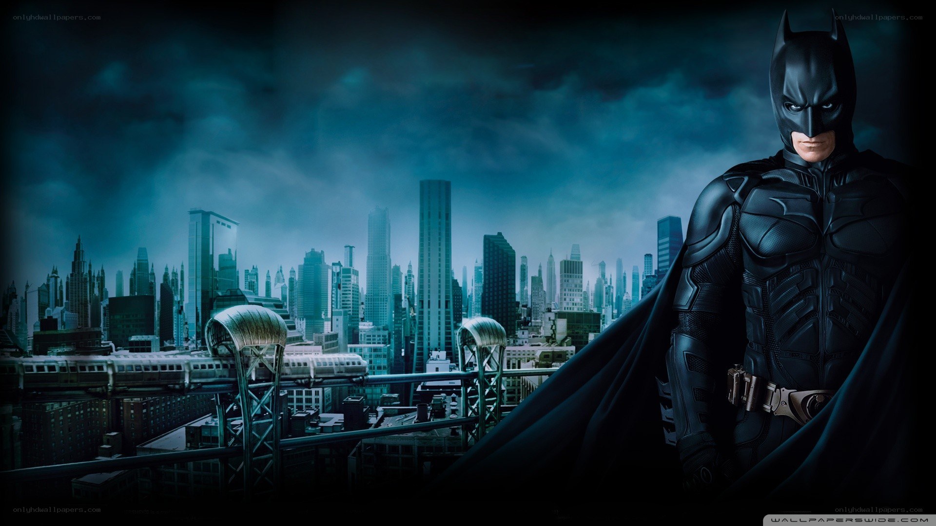 Batman stands over Gotham City