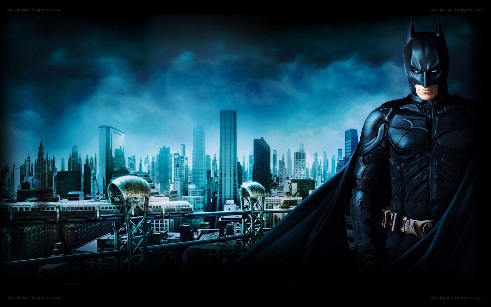 Batman stands over Gotham City