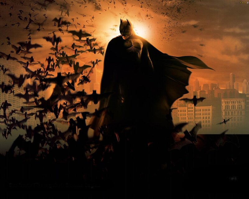 Batman stands with bats