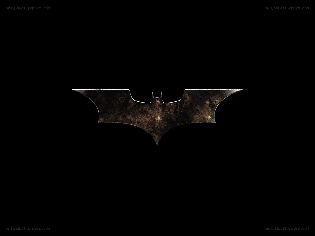 Batman symbol on black background