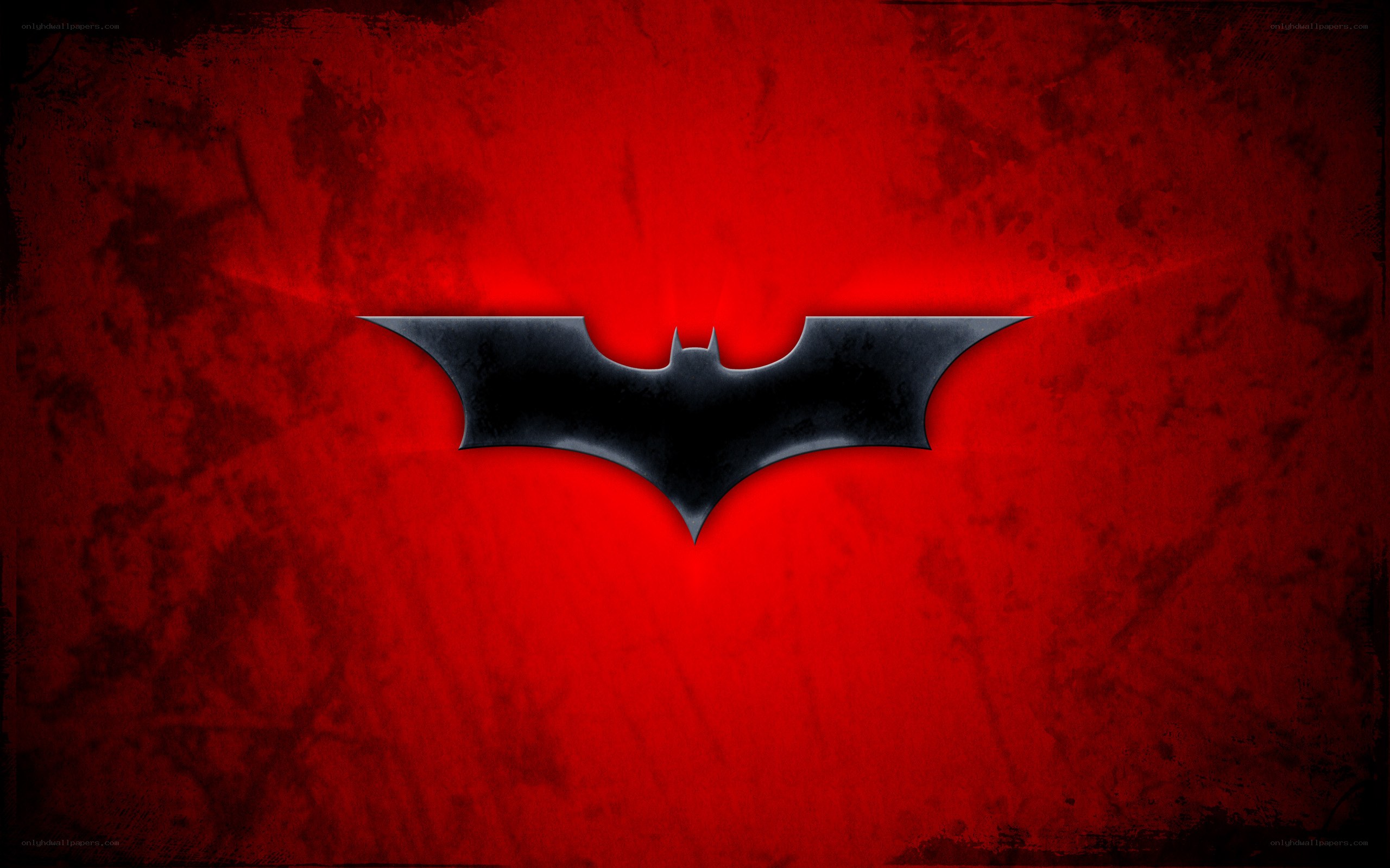 Batman symbol on red background