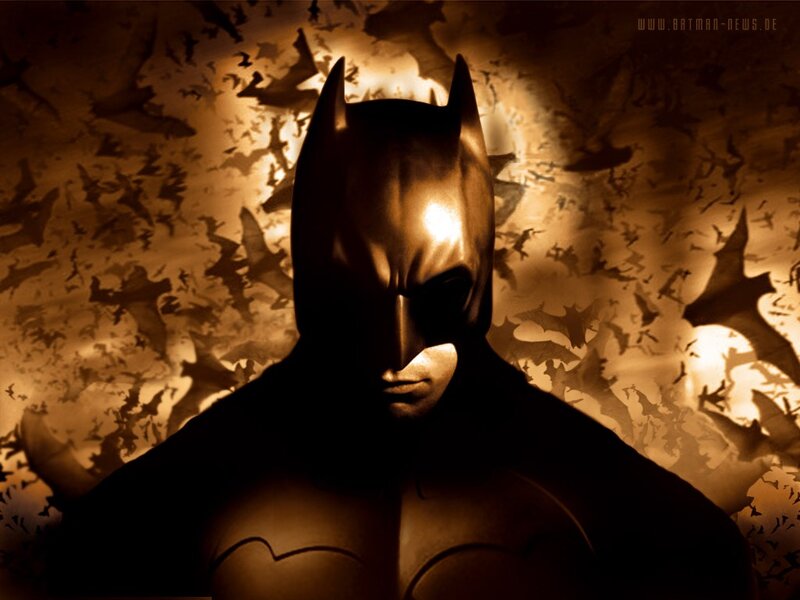 Batman with bats in background
