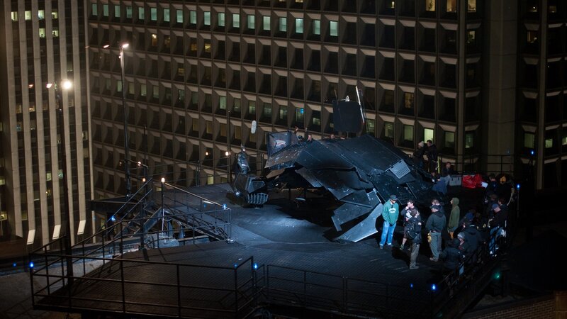 Batpod on rooftop at night