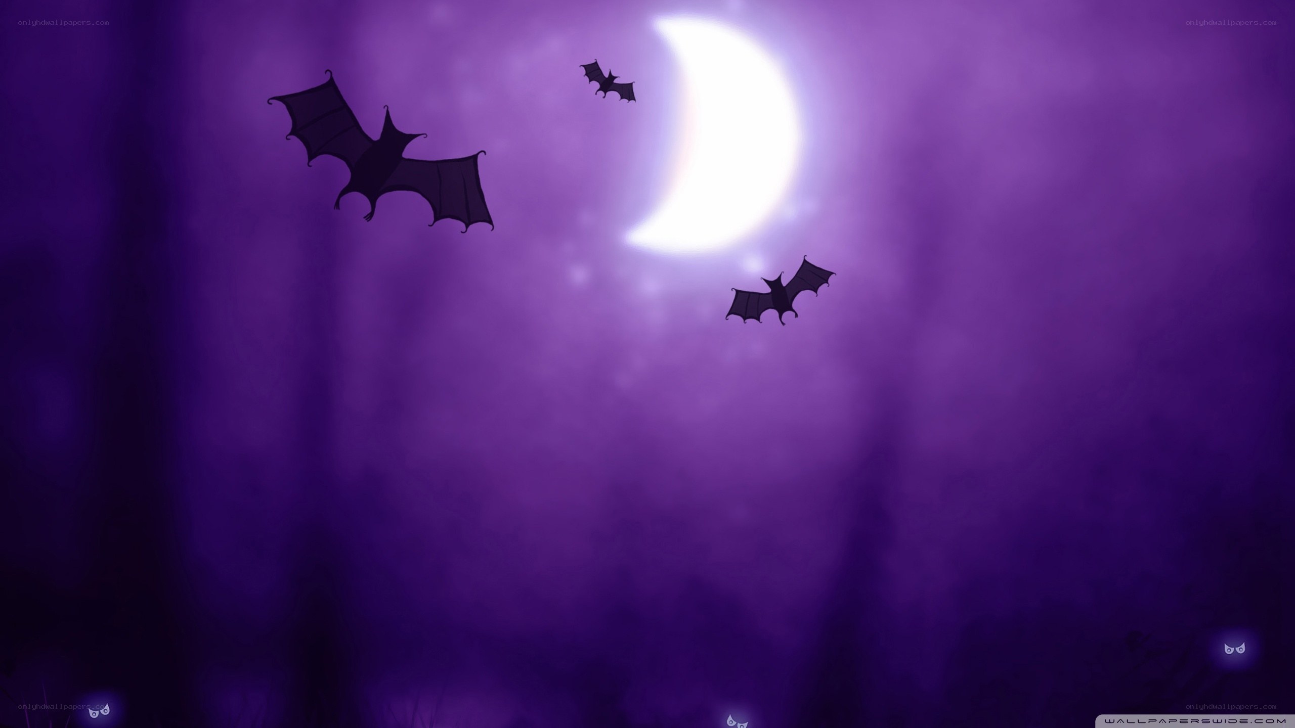 Bats flying under a purple moon