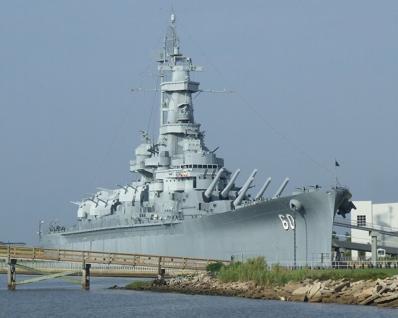 Battleship at a dock