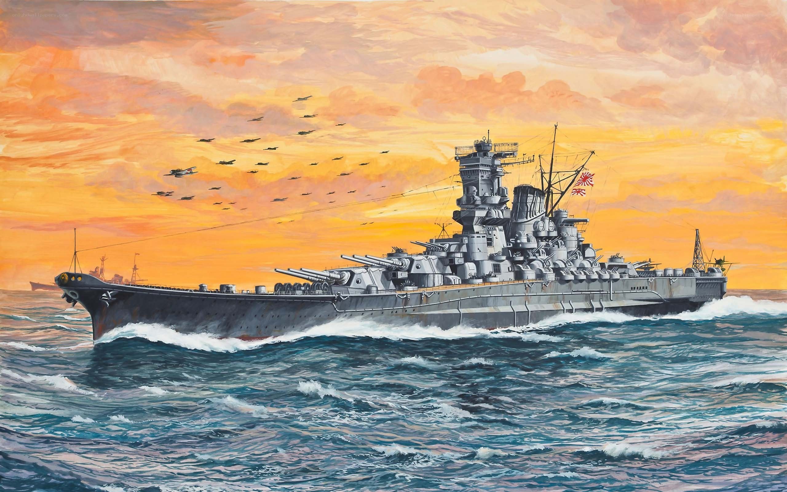 Battleship at sea during sunset