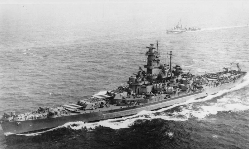 Battleship at sea with escort