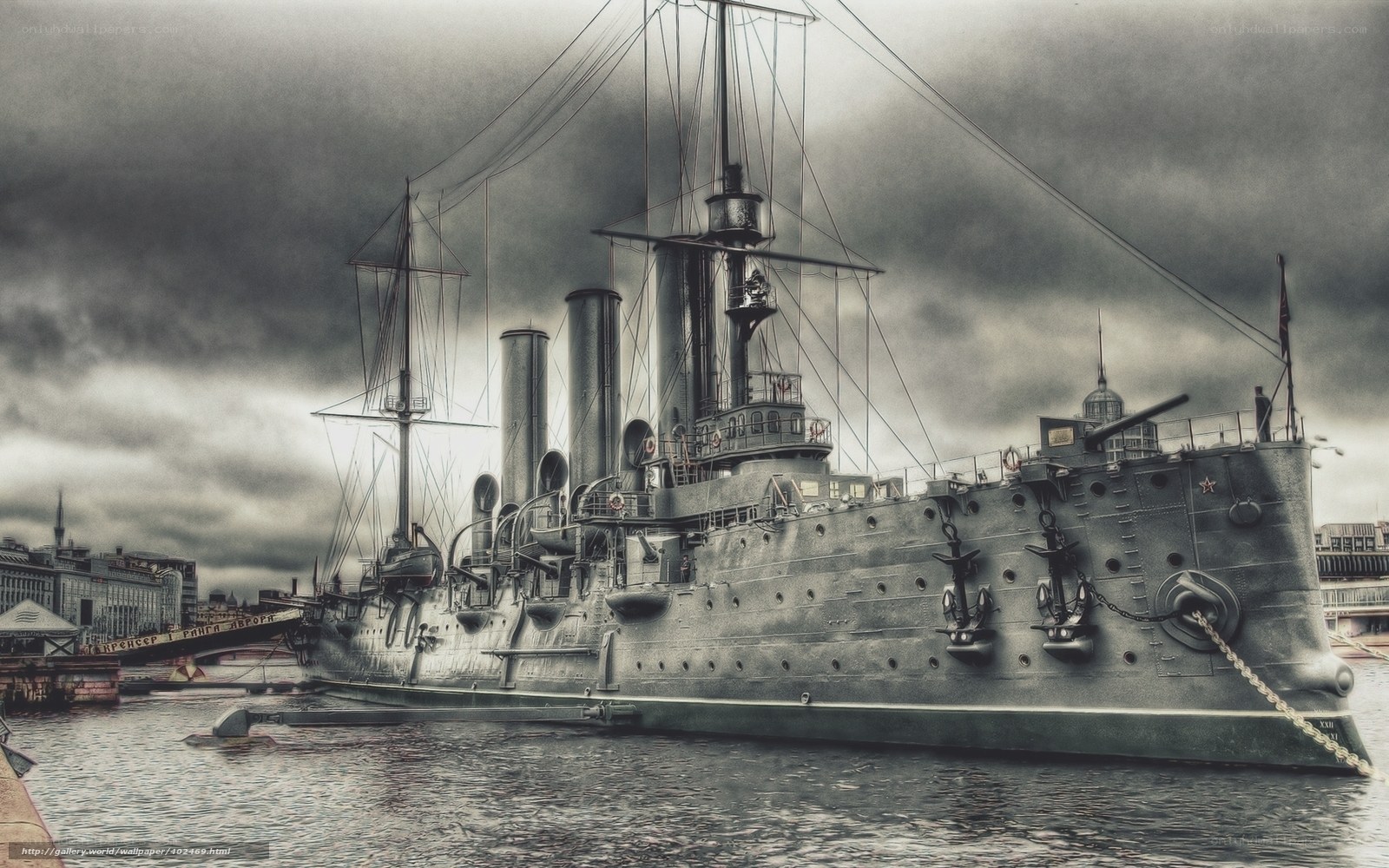 Battleship in a cloudy harbor