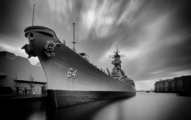 Battleship in Harbor — Black, Dramatic, Photograph