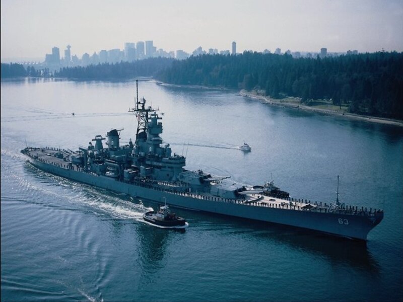 Battleship in Harbor — Blue, Calm, Afternoon