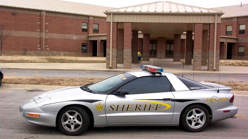 Baxter County Sheriff car at school