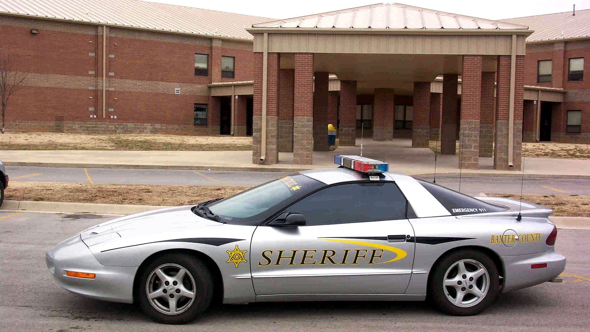 Baxter County Sheriff car at school