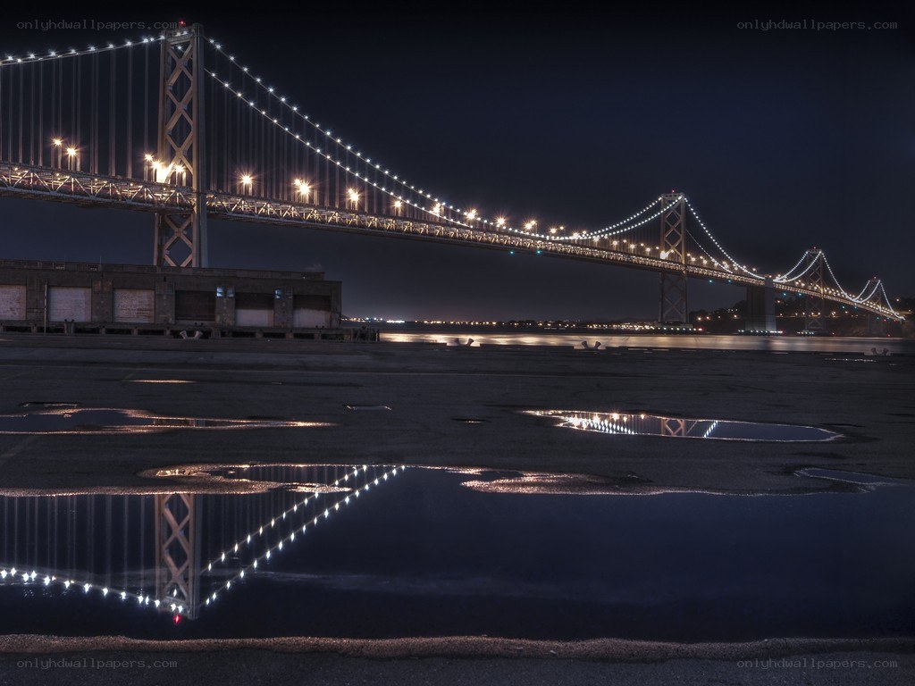 Bay Bridge at night with reflection