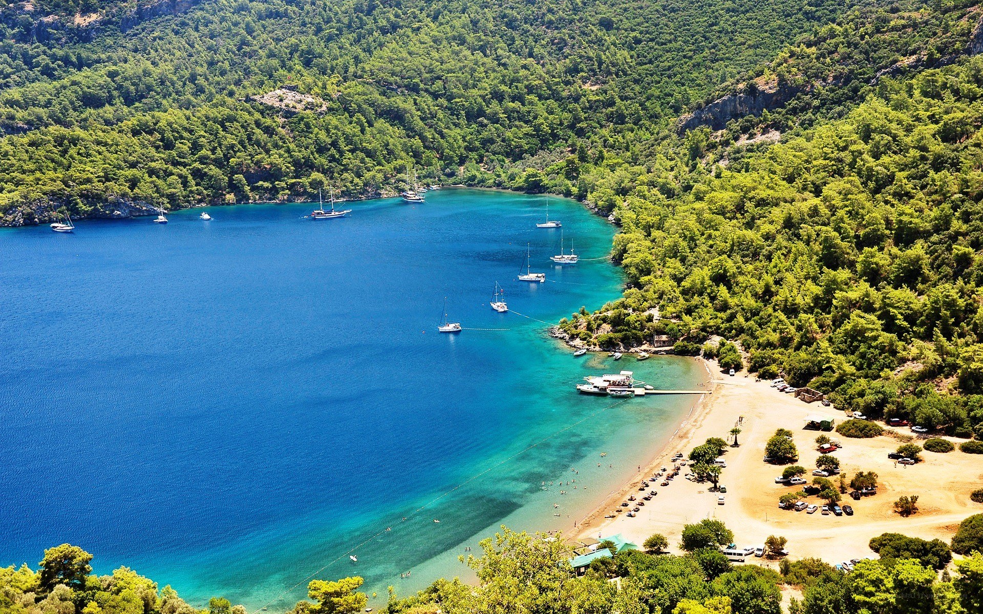 Bay with boats and beach