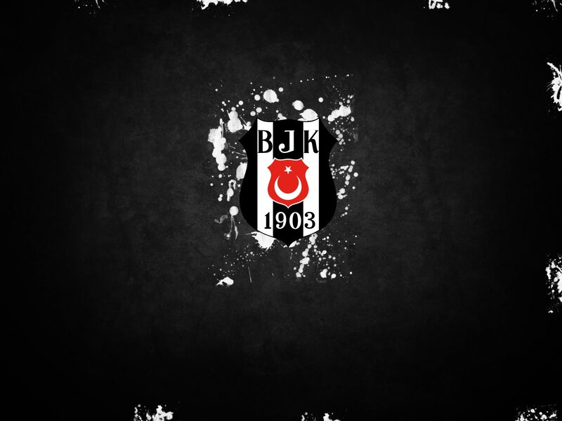 Beşiktaş logo on dark background