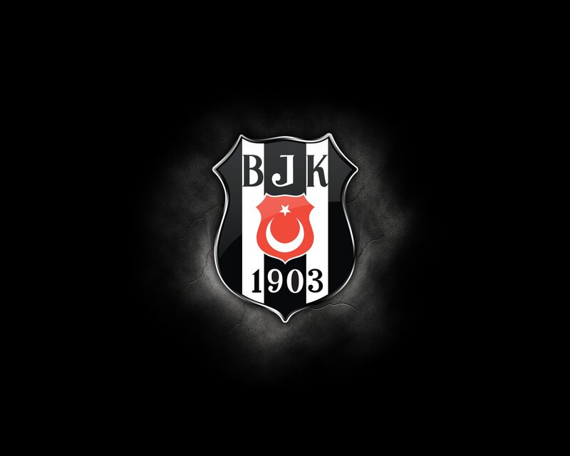 Beşiktaş logo on dark background