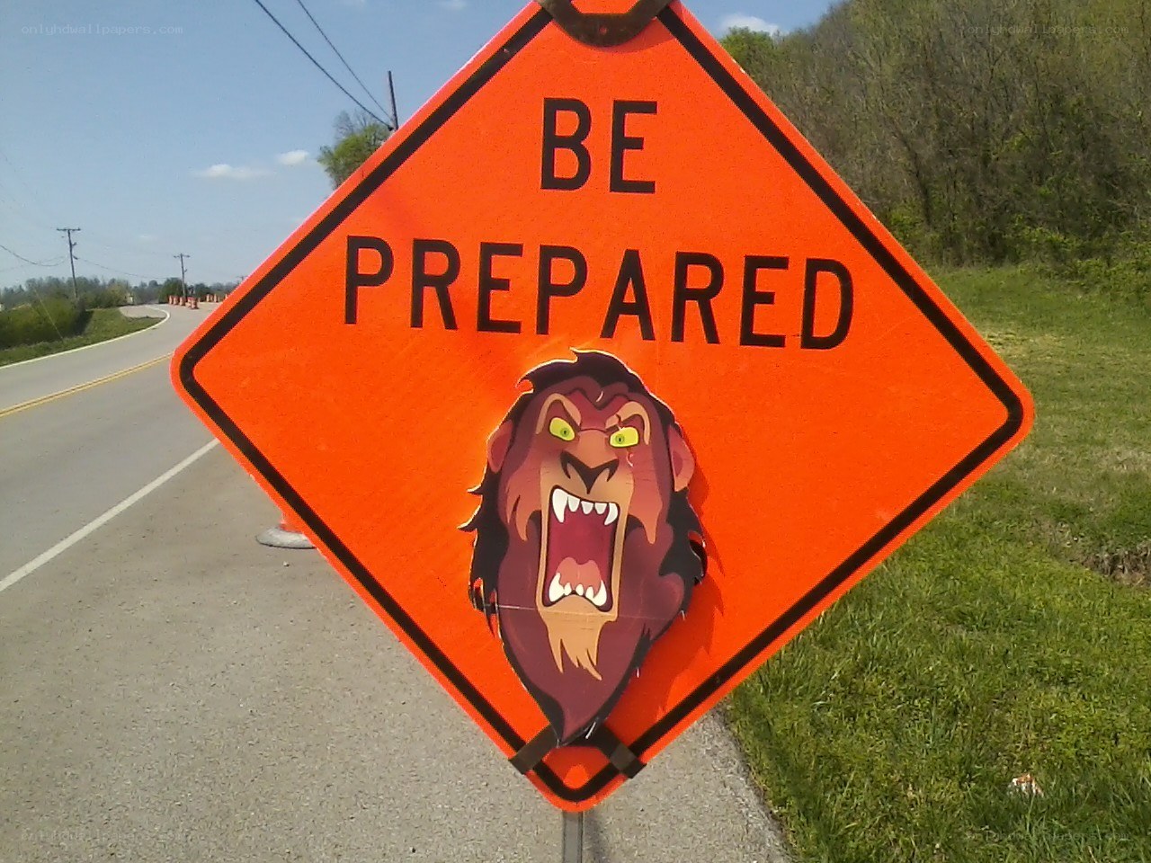 Be Prepared road sign with lion