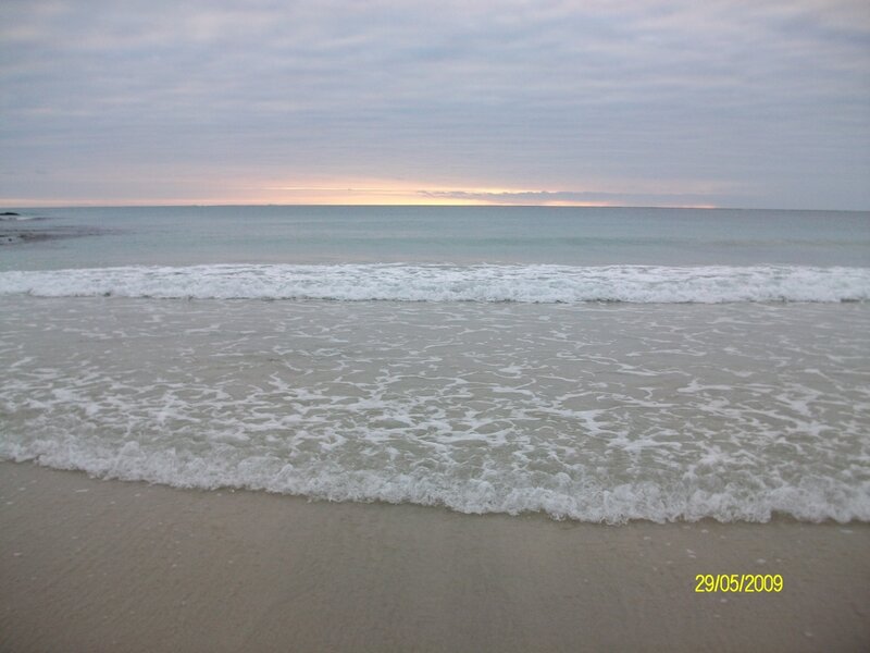 beach at dawn with gentle waves