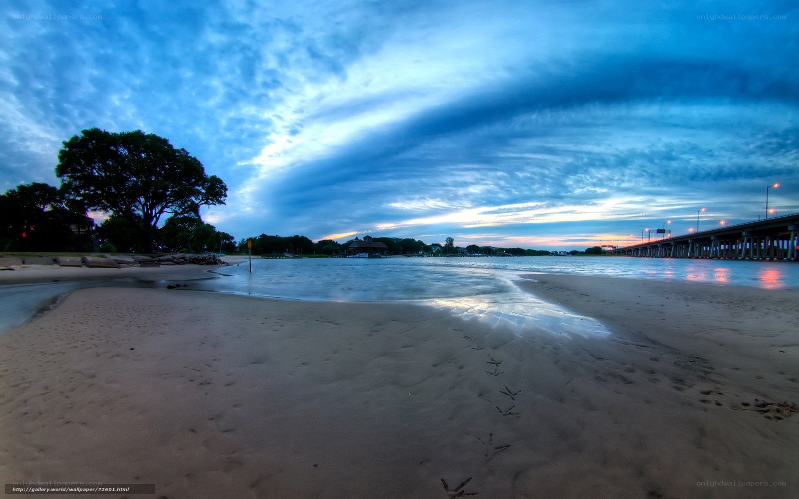 Beach at Dusk with Bridge