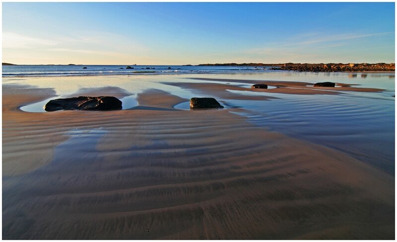 Beach at low tide with rocks