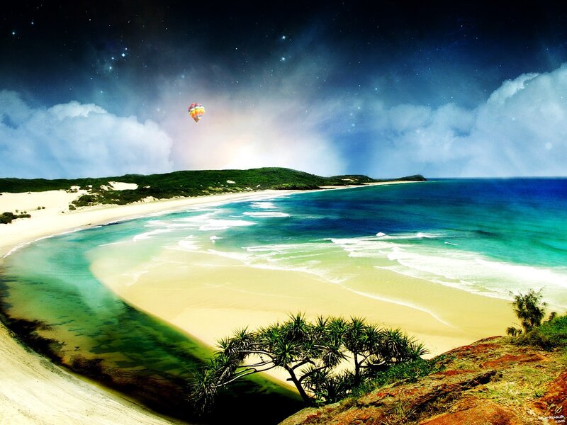 Beach at night with hot air balloon