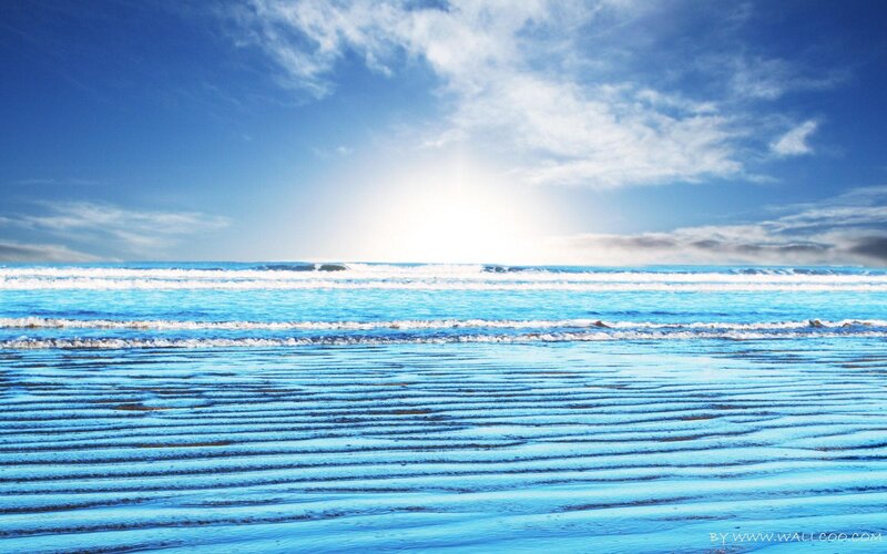 Beach at sunrise with waves