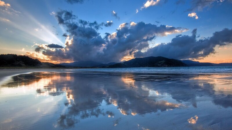 Beach at Sunset — Blue, Dramatic, Photograph, Clouds, Mountains