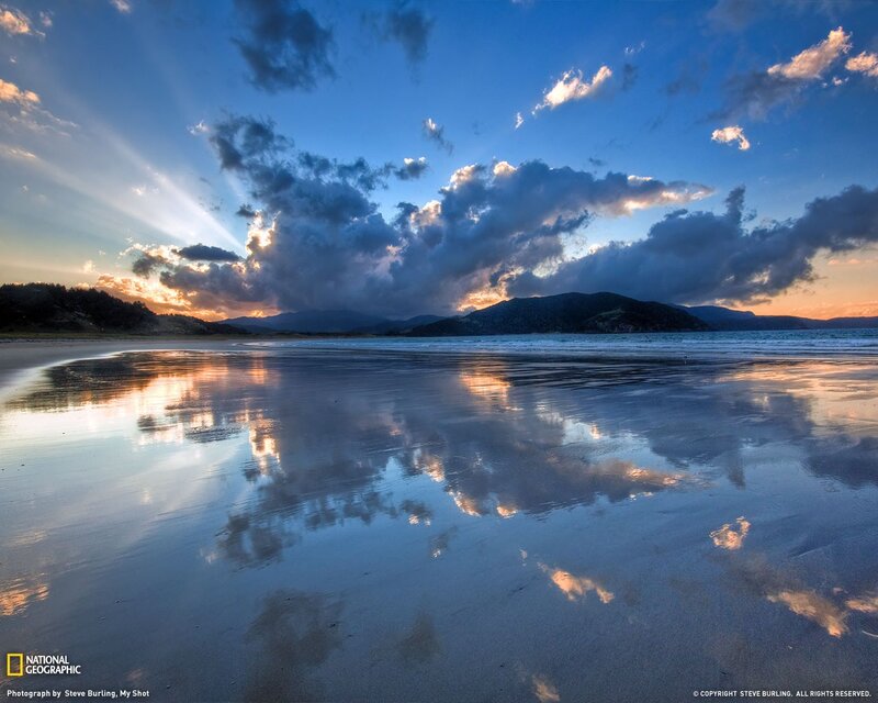 Beach at Sunset — Blue, Dramatic, Photograph, Mountains, Clouds, Reflection