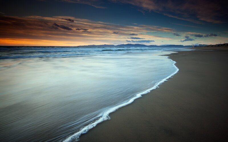 Beach at Sunset — Blue, Serene, Photograph, Ocean, Sky, Mountains