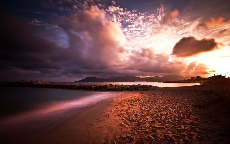 Beach at Sunset — Orange, Dramatic, Photograph, Clouds, Mountains