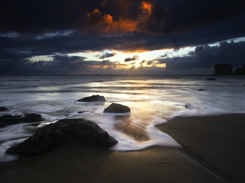 Beach at Sunset — Orange, Dramatic, Photograph, Rocks, Ocean, Clouds, Black, Gray