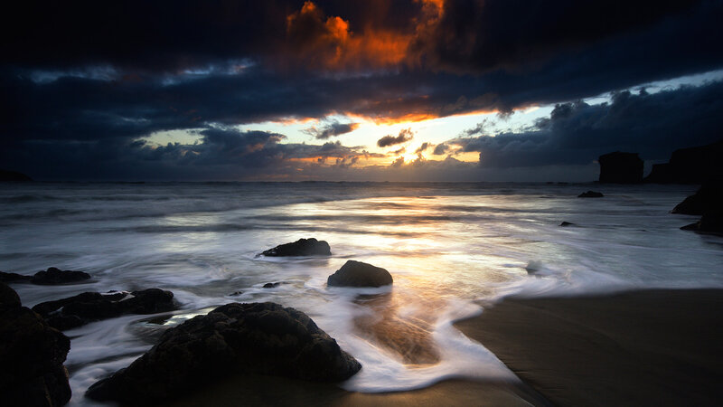 Beach at Sunset — Orange, Dramatic, Photograph, Rocks, Ocean, Clouds