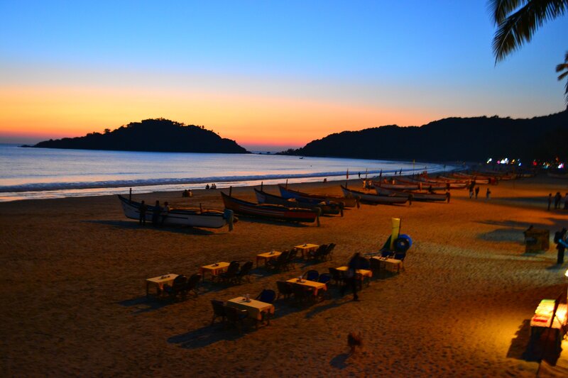 Beach at sunset with boats